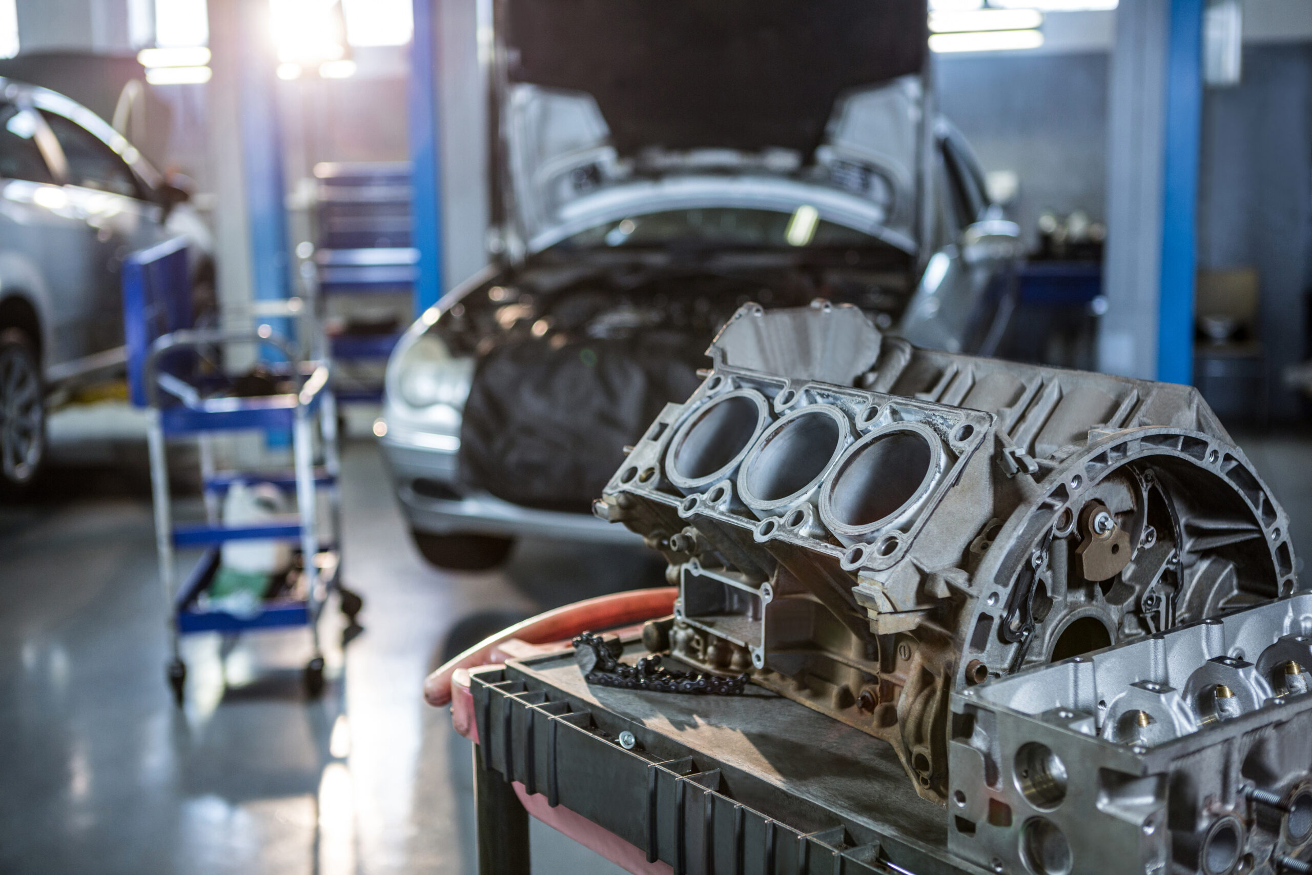 Close-up of car parts in repair garage